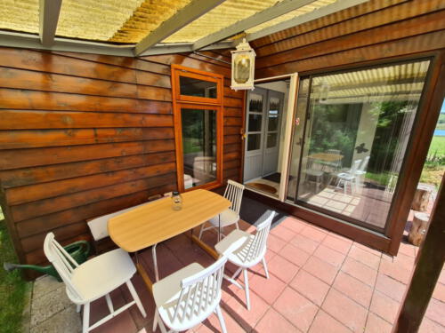 Entree onder overdekt terras